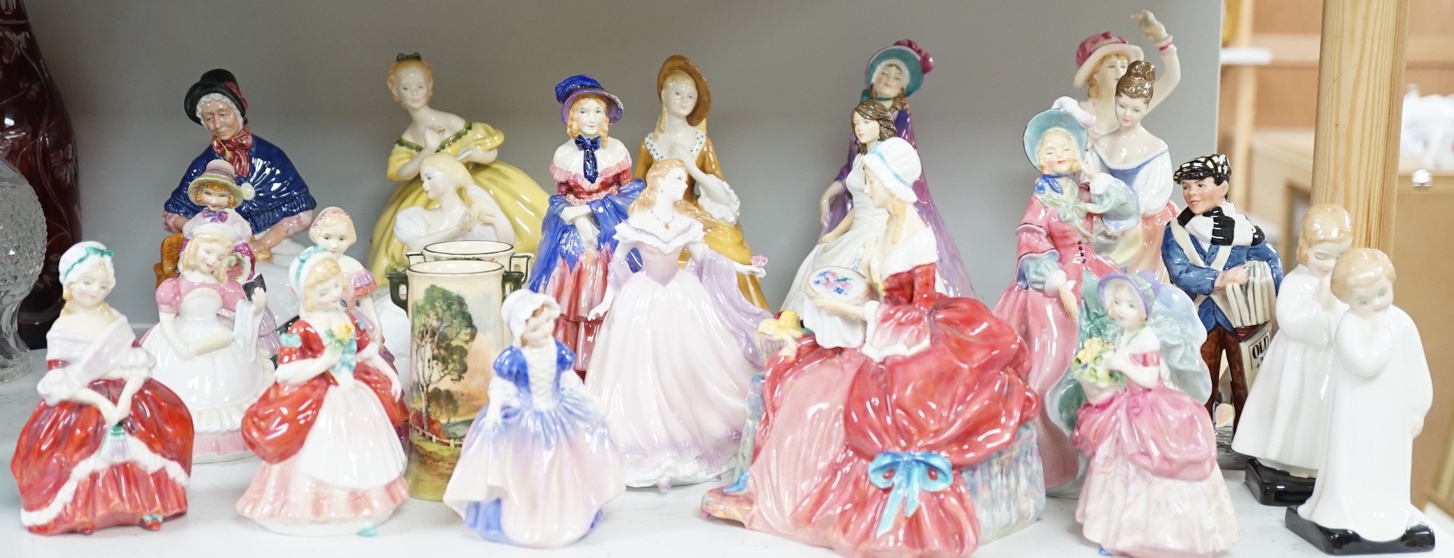 A quantity of Royal Doulton figures, to include Peggy, Valerie, Dinky Do, Penelope, Cissie, and others. Approx. Twenty-four